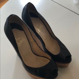 Christian Louboutin black leather wedges